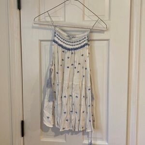 Lightly used white and blue floral blouse size medium